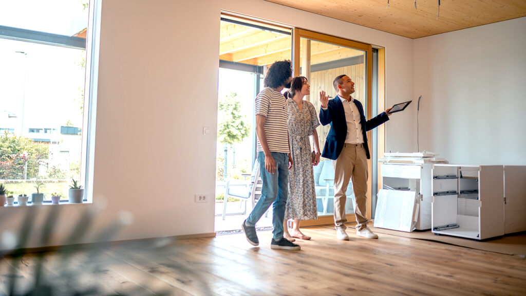 Home buying couple real estate agent